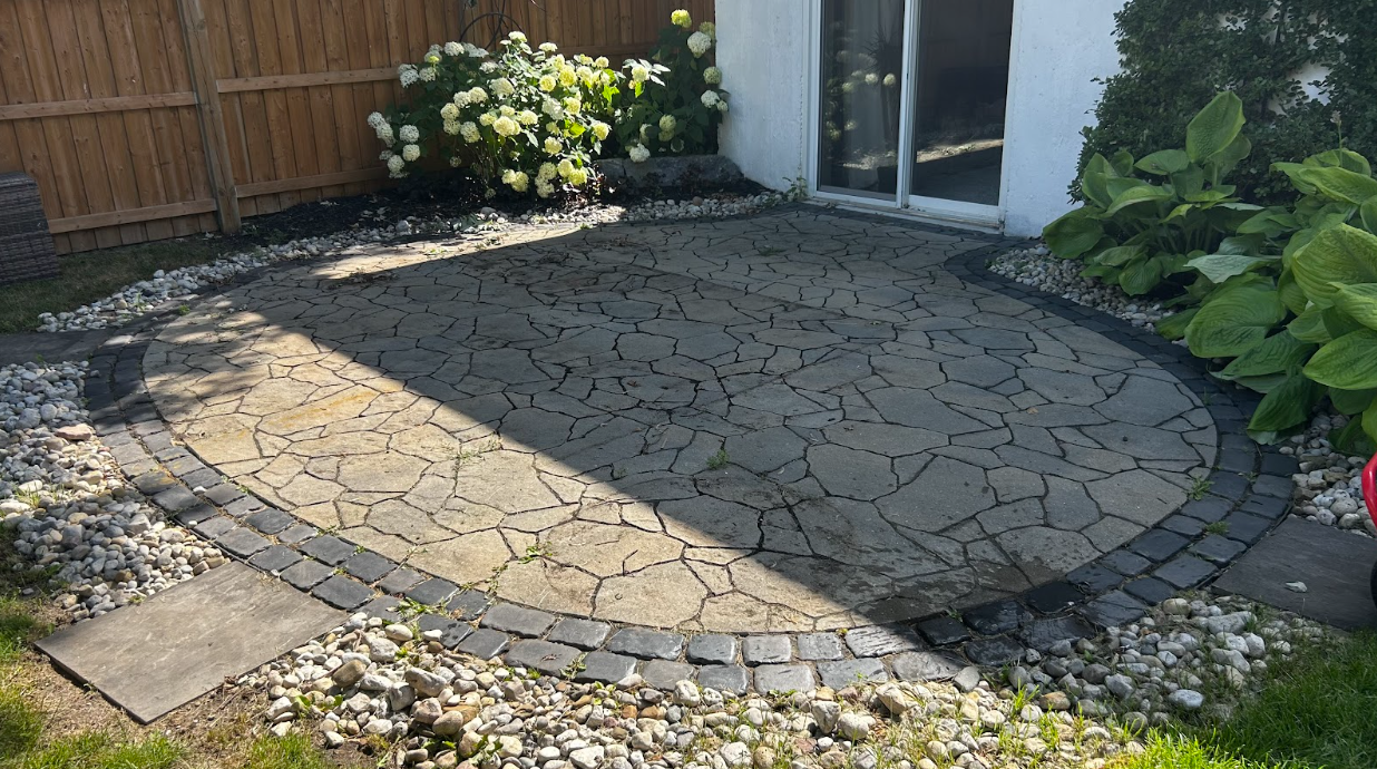 Patio surface before powerwashing